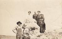 Four People on a Rock