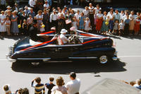 Man driving a Convertible in 1949 Grinnell Day Parade