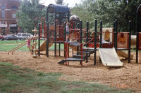 A Child Playing on New Central Park Playground