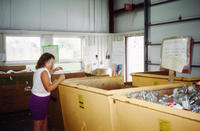 Woman at Recycling Center