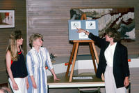 Three Women Presenting  Grinnell Logo Idea