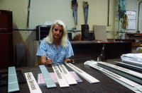 Woman Working on Hospital Signs