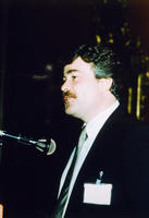 Man Standing at Microphone