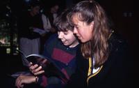 Students Browse a Pamphlet at a Watson Fellowship Event