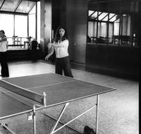 Student playing table tennis