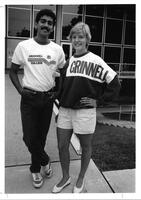 Students Wearing Grinnell Merchandise in front of Burling