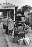 Student with Luggage and Carriage